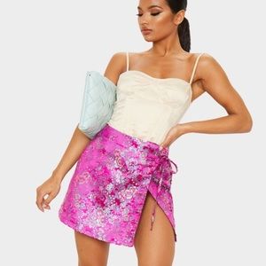 Pink oriental wrap satin mini skirt